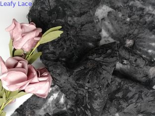 Il partito svuotato del ricamo merletta il tessuto nero di applique dello zecchino 3D