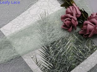 Il tessuto legato con corde 100% del pizzo del poliestere ha personalizzato il tessuto ricamato di colore