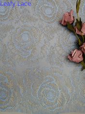 Tessuto metallico floreale del pizzo