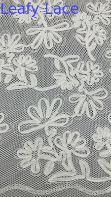 Ricamo a maglia di cotone con disegno floreale tessuto sostenibile a tutta larghezza per la primavera e l'estate