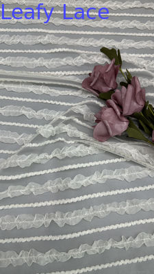 Tessuti a maglia di tulle Tessuti a maglia di pizzo Tessuti plissati per abbigliamento Moda e design