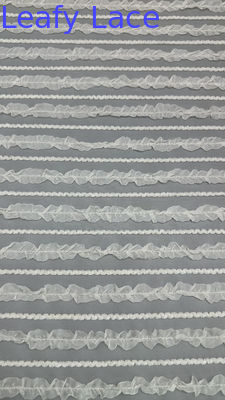 Tessuti a maglia di tulle Tessuti a maglia di pizzo Tessuti plissati per abbigliamento Moda e design