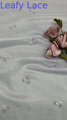 Tessuto in rete di tulle con paillettes metalliche - Nuova collezione per abiti e vestiti
