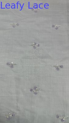 Tessuto in rete di tulle con paillettes metalliche - Nuova collezione per abiti e vestiti