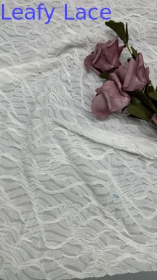 Tessuto in pizzo a rete bianco a griglia lavorato a maglia traforato di lusso per abiti da festa estivi