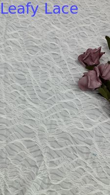 Tessuto in pizzo a rete bianco a griglia lavorato a maglia traforato di lusso per abiti da festa estivi