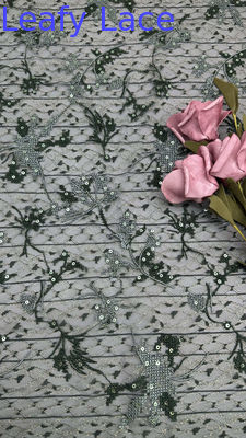Tissu di rete floreale ricamato in pacco nero Eleganza pura con sottile lucentezza Per nuova collezione