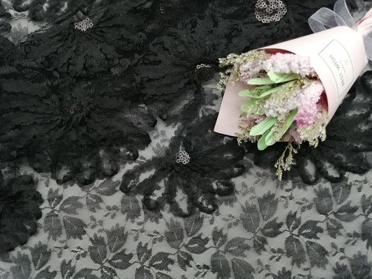 Il partito svuotato del ricamo merletta il tessuto nero di applique dello zecchino 3D