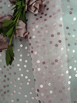 Lo zecchino trasparente rosa ha ricamato l'organza Tulle del tessuto per abito